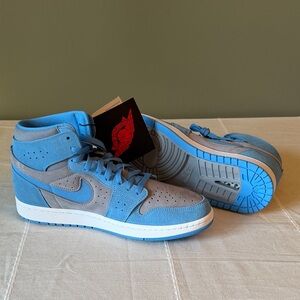 Nike Air Jordan’s Men's High-Top Athletic Sneakers in Sky Blue and Gray